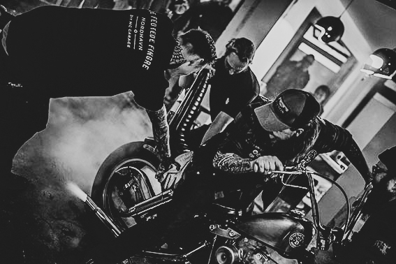 biker spinning motorcycle back wheel (burnout)